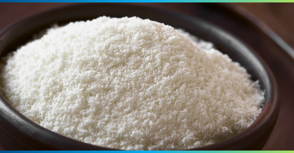 A bowl heaped with fine white cheese powder